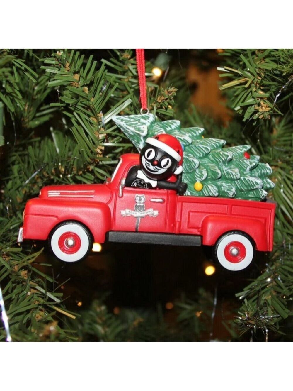 Kit-Cat Klock driving a red truck LIGHT UP Christmas Ornament